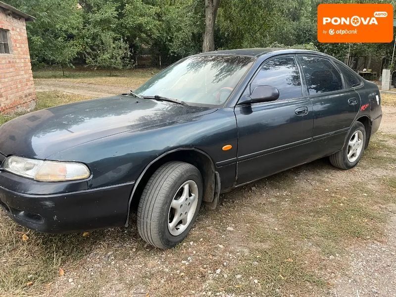 Mazda 626, 1995 г., Газ метан / Бензин, 705 тыс. км, Хетчбек, Синий, Кропивницкий (Кировоград) AT-10402594 фото