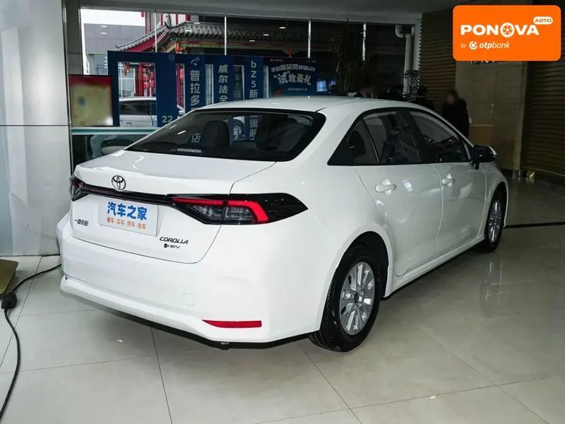 Toyota Corolla, 2026 г., Гибрид (HEV), Седан, Белый, Львов AT-10418582 фото