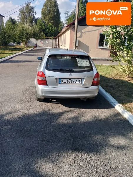 Mazda 323, 2001 г., Дизель, 300 тыс. км, Хетчбек, Серый, Першотравенськ AT-10400744 фото