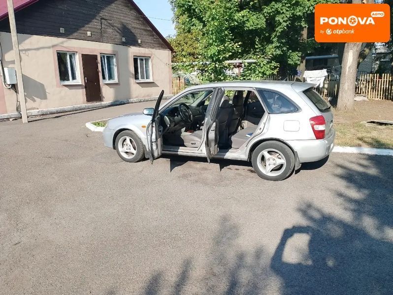 Mazda 323, 2001 г., Дизель, 300 тыс. км, Хетчбек, Серый, Першотравенськ AT-10400744 фото