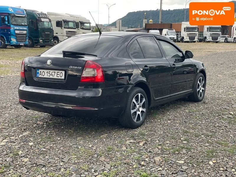 Skoda Octavia, 2010 р., Дизель, 261 тис. км, Седан, Чорний, Хуст AT-10406344 фото