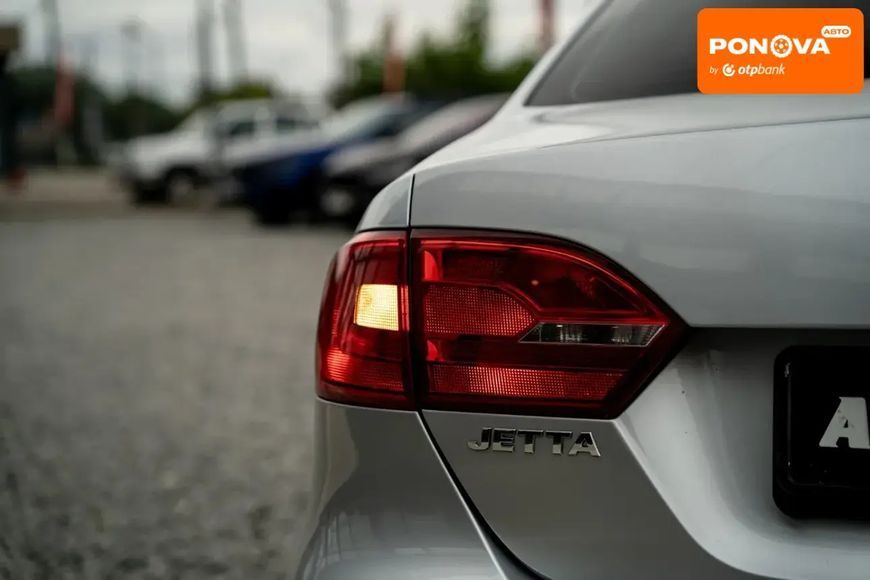 Volkswagen Jetta, 2012 р., Бензин, 122 тис. км, Седан, Сірий, Чернівці AT-10404224 фото