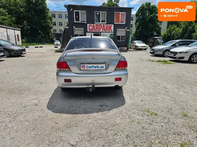 Mitsubishi Lancer, 2004 г., Бензин, 223 тыс. км, Седан, Серый, Каменское (Днепродзержинск) AT-10420522 фото