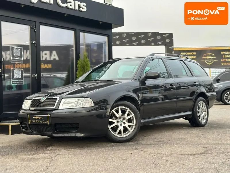 Skoda Octavia, 2009 р., Бензин, 228 тис. км, Універсал, Чорний, Харків AT-10403223 фото