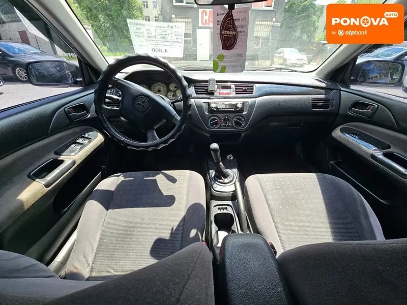 Mitsubishi Lancer, 2004 г., Бензин, 223 тыс. км, Седан, Серый, Каменское (Днепродзержинск) AT-10420522 фото