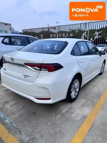 Toyota Corolla, 2025 р., Гібрид (HEV), Седан, Білий, Львів AT-10397527 фото