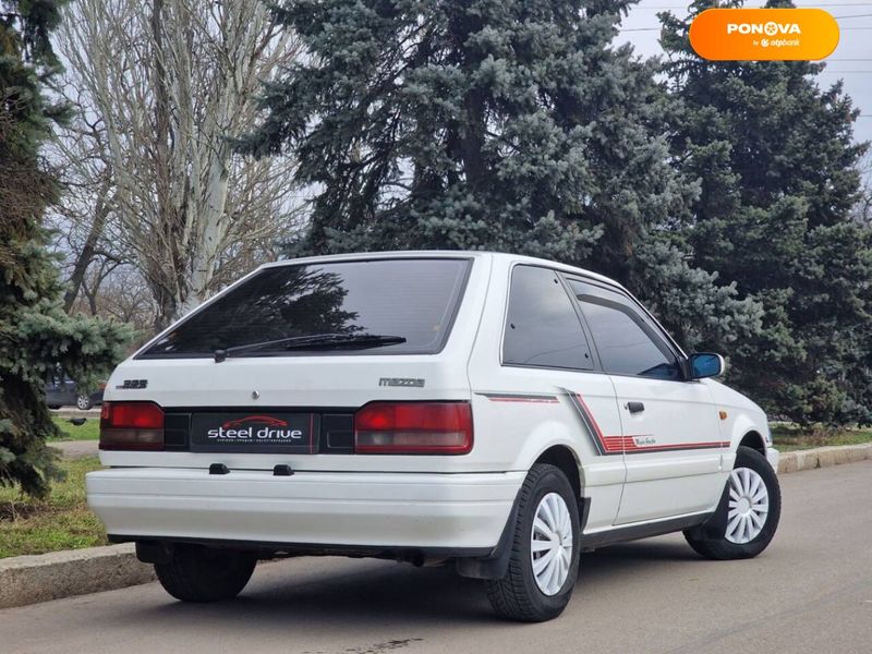 Mazda 323, 1989, Газ пропан-бутан / Бензин, 1.6 л., 240 тыс. км, Хетчбек, Белый, Николаев 21549 фото