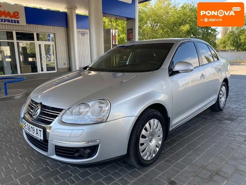 Volkswagen Jetta, 2009 г., Бензин, 129 тыс. км, Седан, Серый, Николаев AT-10403302 фото