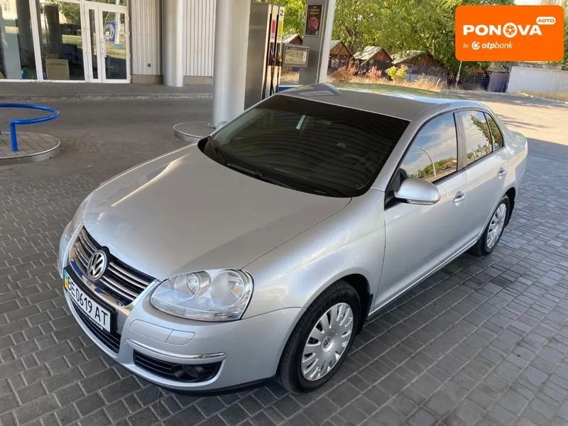 Volkswagen Jetta, 2009 г., Бензин, 129 тыс. км, Седан, Серый, Николаев AT-10403302 фото