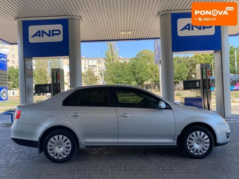 Volkswagen Jetta, 2009 г., Бензин, 129 тыс. км, Седан, Серый, Николаев AT-10403302 фото