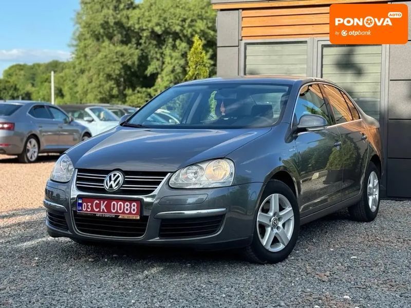 Volkswagen Jetta, 2006 р., Бензин, 219 тис. км, Седан, Сірий, Дрогобич AT-10401480 фото