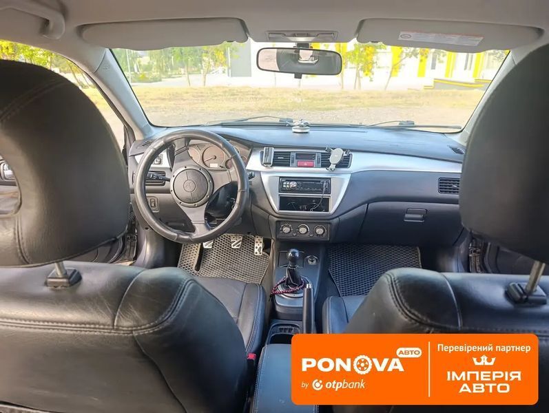 Mitsubishi Lancer, 2006 г., Бензин, 260 тыс. км, Универсал, Серый, Нова Долина AT-10432233 фото
