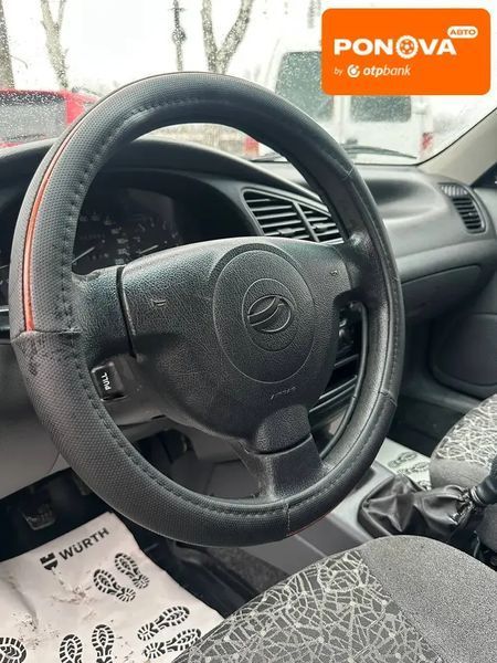 Daewoo Lanos, 2011 р., Газ пропан-бутан / Бензин, 203 тис. км, Седан, Сірий, Сміла AT-10410507 фото