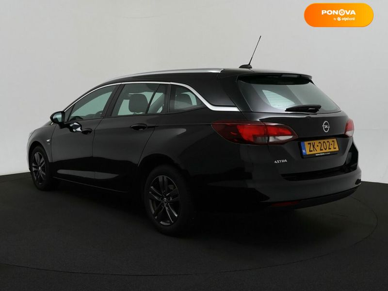 Opel Astra, 2019, Бензин, 1 л., 147 тыс. км, Универсал, Чорный, Луцк Cars-EU-US-KR-111258 фото