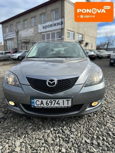 Mazda 3, 2003 р., Бензин, 216 тис. км, Хетчбек, Сірий, Сміла AT-10411567 фото