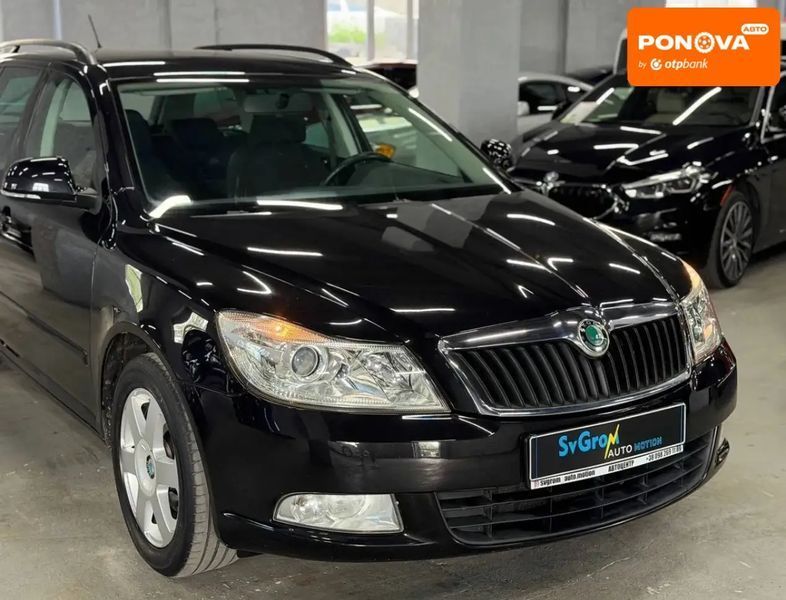 Skoda Octavia, 2011 р., Бензин, 217 тис. км, Універсал, Чорний, Кам'янське (Дніпродзержинськ) AT-10418496 фото