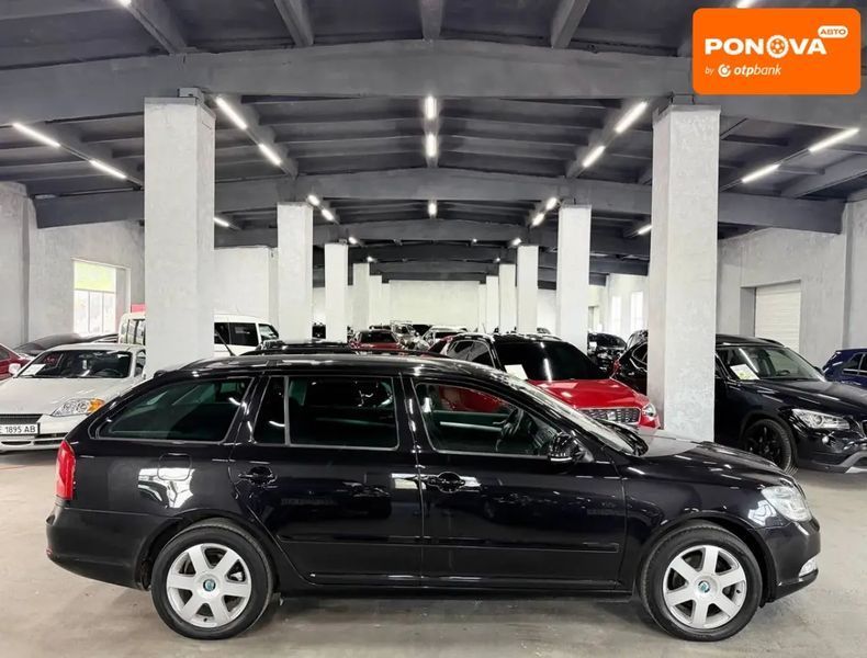 Skoda Octavia, 2011 р., Бензин, 217 тис. км, Універсал, Чорний, Кам'янське (Дніпродзержинськ) AT-10418496 фото