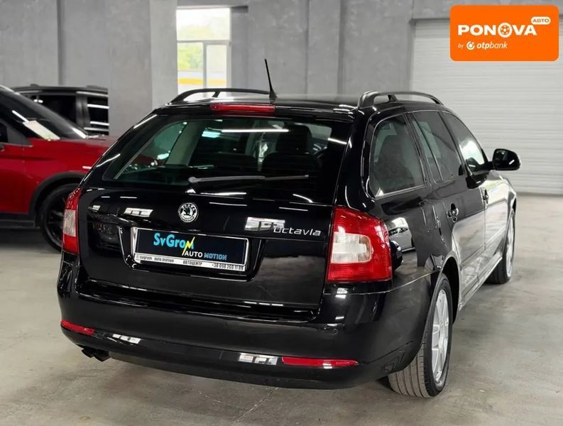 Skoda Octavia, 2011 р., Бензин, 217 тис. км, Універсал, Чорний, Кам'янське (Дніпродзержинськ) AT-10418496 фото