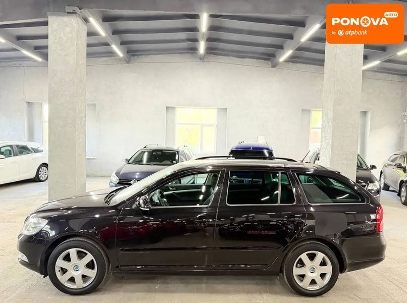 Skoda Octavia, 2011 р., Бензин, 217 тис. км, Універсал, Чорний, Кам'янське (Дніпродзержинськ) AT-10418496 фото