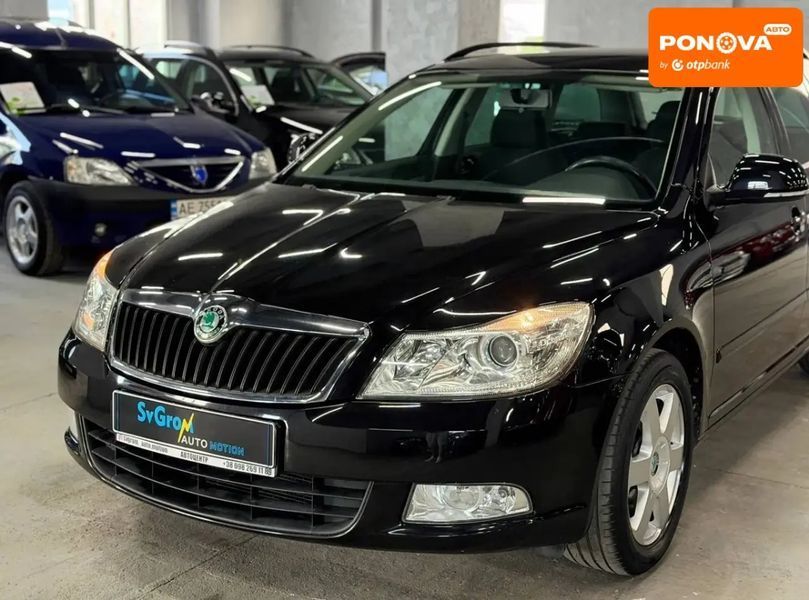 Skoda Octavia, 2011 р., Бензин, 217 тис. км, Універсал, Чорний, Кам'янське (Дніпродзержинськ) AT-10418496 фото