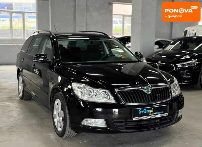 Skoda Octavia, 2011 р., Бензин, 217 тис. км, Універсал, Чорний, Кам'янське (Дніпродзержинськ) AT-10418496 фото