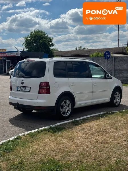 Volkswagen Touran, 2008 г., Дизель, 269 тыс. км, Минивен, Белый, Кам'янка AT-10421295 фото