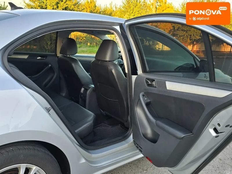 Volkswagen Jetta, 2014 г., Бензин, 172 тыс. км, Седан, Серый, Хмельницкий AT-10402801 фото