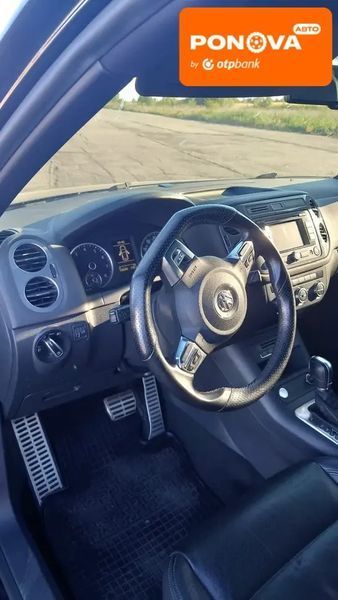 Volkswagen Tiguan, 2014 р., Бензин, 125 тис. км, Позашляховик / Кросовер, Чорний, Пирятин AT-10406324 фото