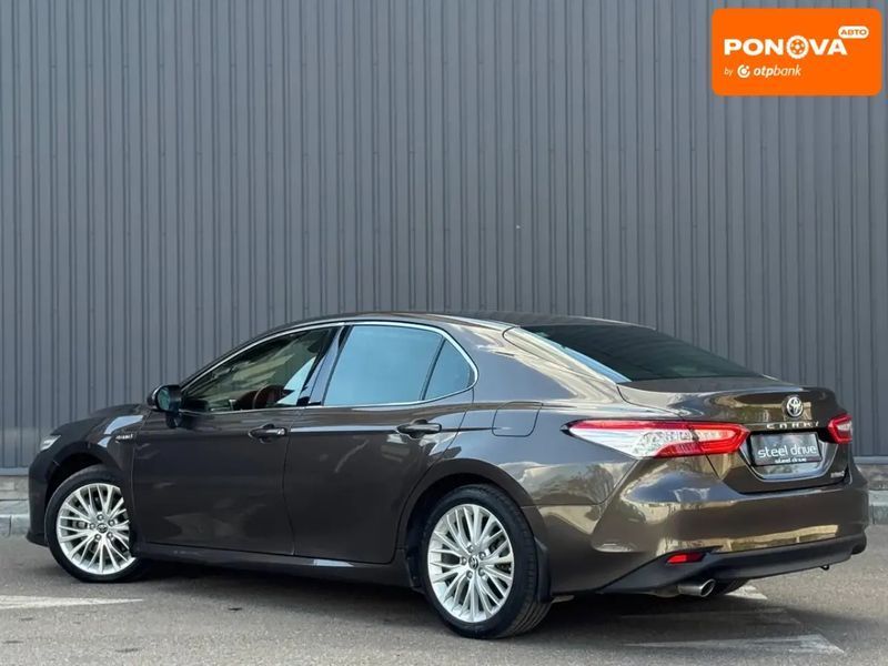 Toyota Camry, 2019 г., Гибрид (HEV), 96 тыс. км, Седан, Коричневый, Николаев AT-10417487 фото