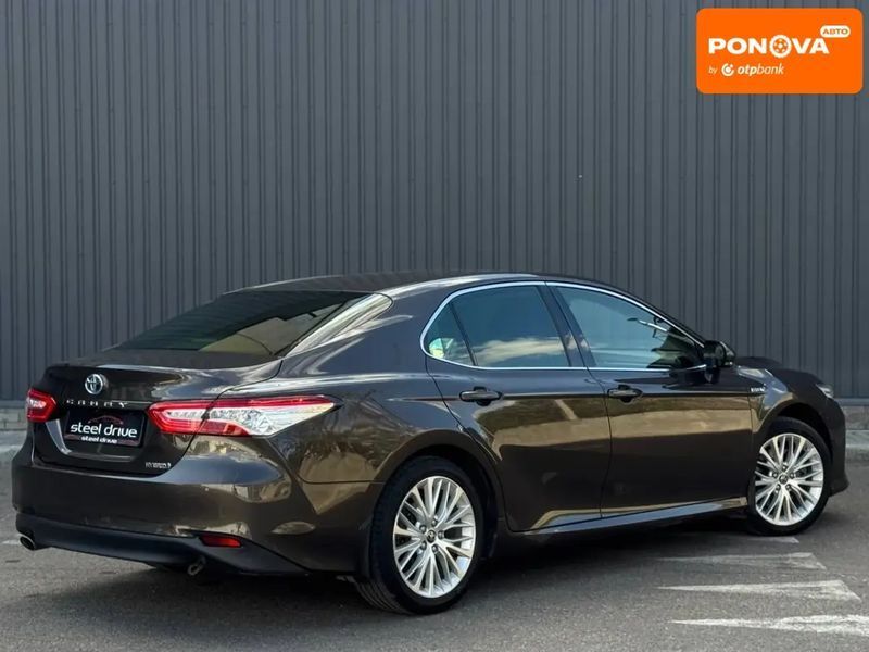 Toyota Camry, 2019 г., Гибрид (HEV), 96 тыс. км, Седан, Коричневый, Николаев AT-10417487 фото