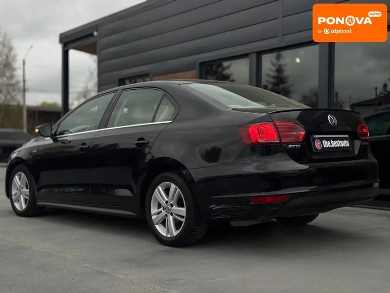 Volkswagen Jetta, 2013 р., Гібрид (HEV), 134 тис. км, Седан, Чорний, Рівне AT-10415530 фото